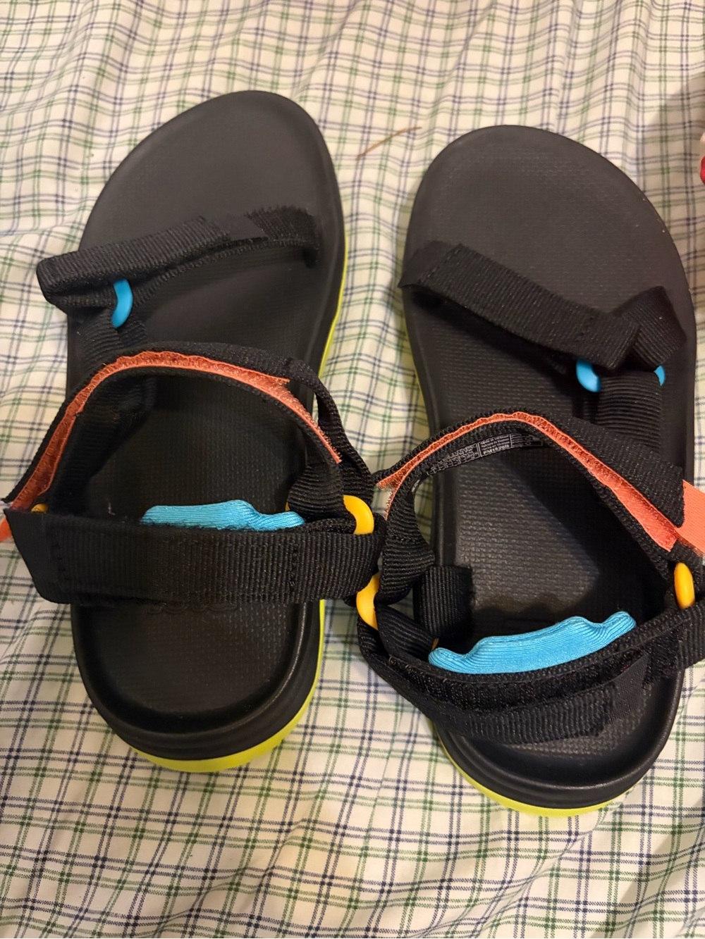 Teva Black Sandals with Blue and Yellow Accents
